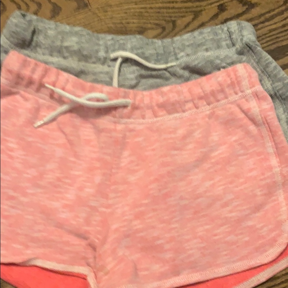 Two pairs of girls old navy large sweat shorts.
